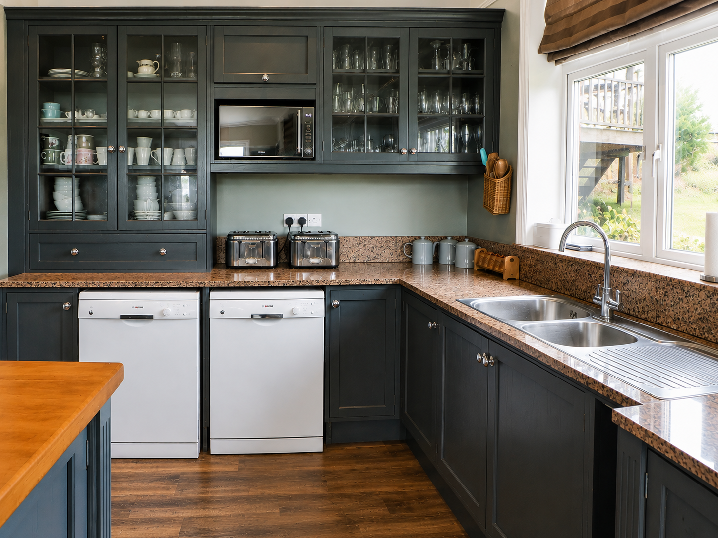 Twin dishwashers and sink in the kitchen at Heather Brae