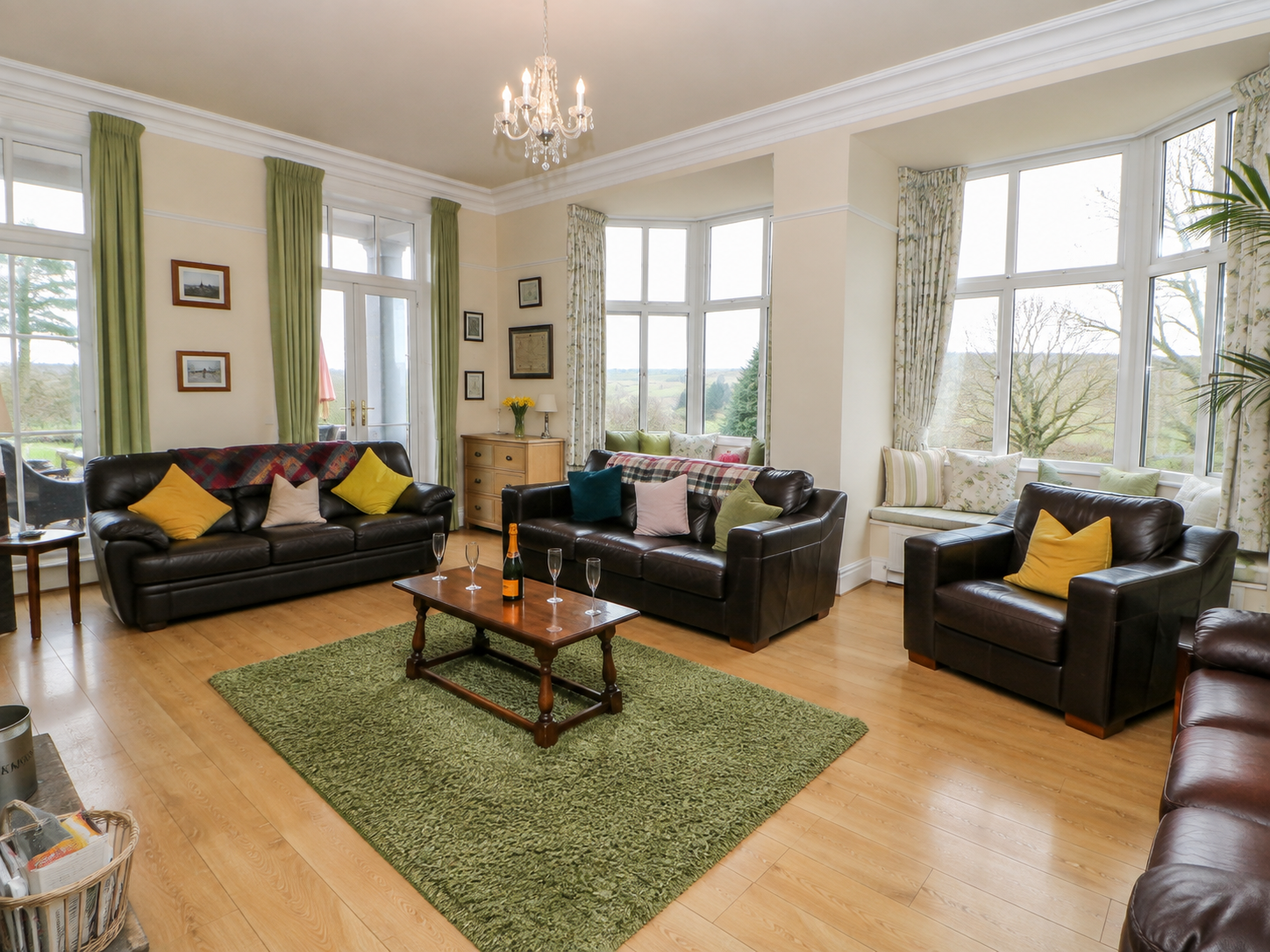 Lounge at Heather Brae with leather sofas and valley views